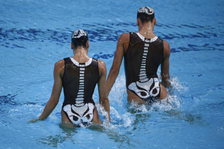 Sync and Snickers: Hilarious Moments in Synchronized Swimming